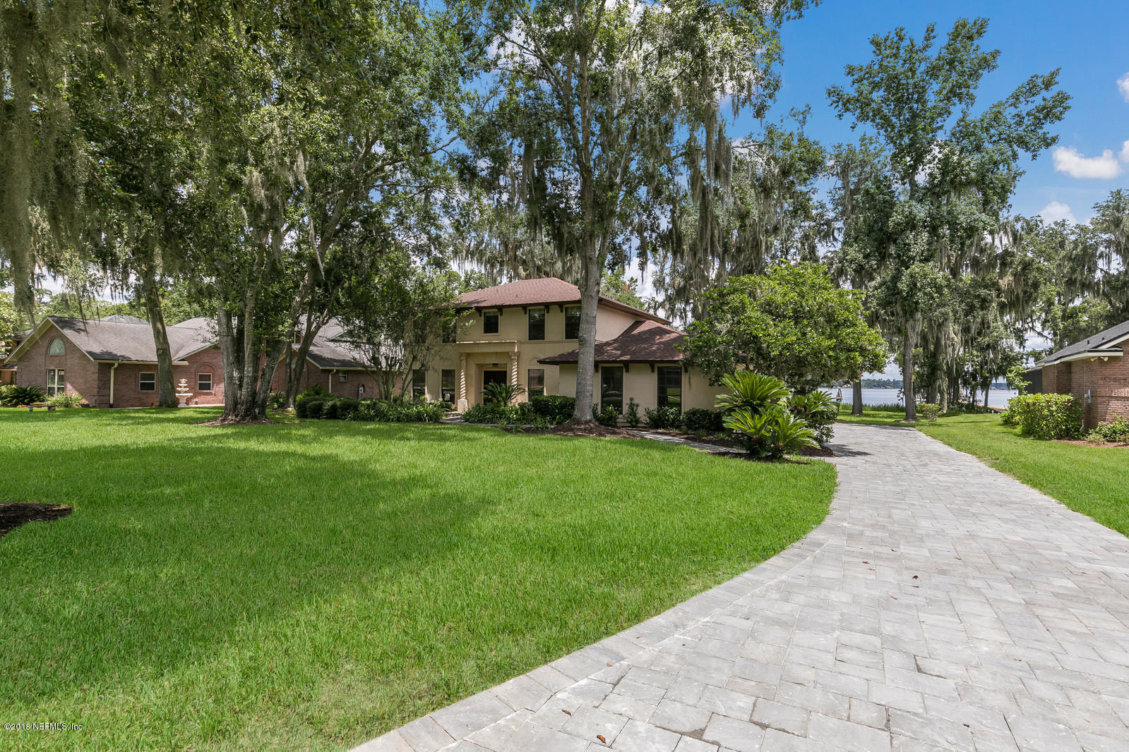 3130 Nautilus Road Middleburg, FL 32068 - Photo 3 of 67 a front view of a house with a yard