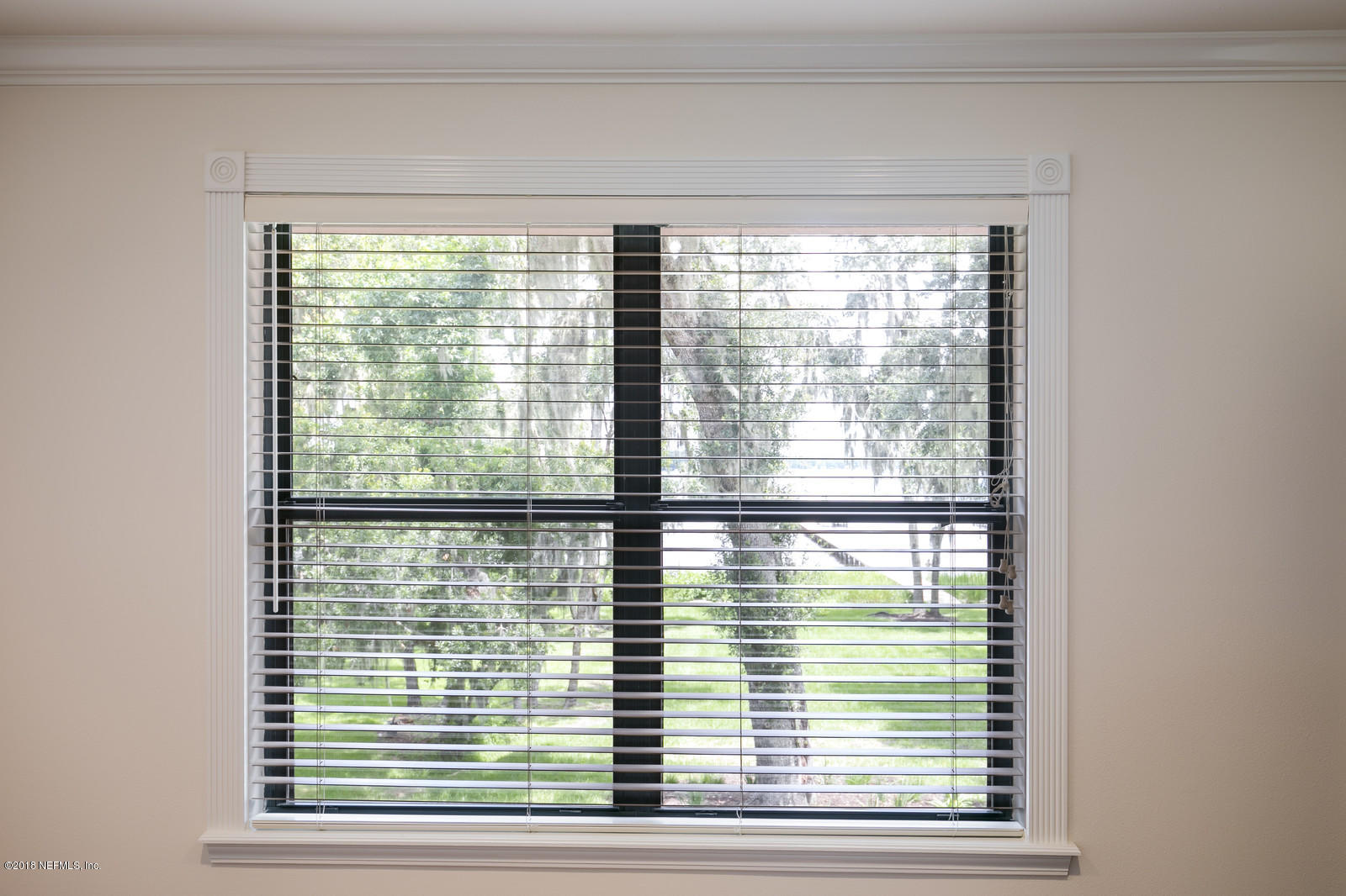 3130 Nautilus Road Middleburg, FL 32068 - Photo 33 of 67 a view of a room that has a window in it