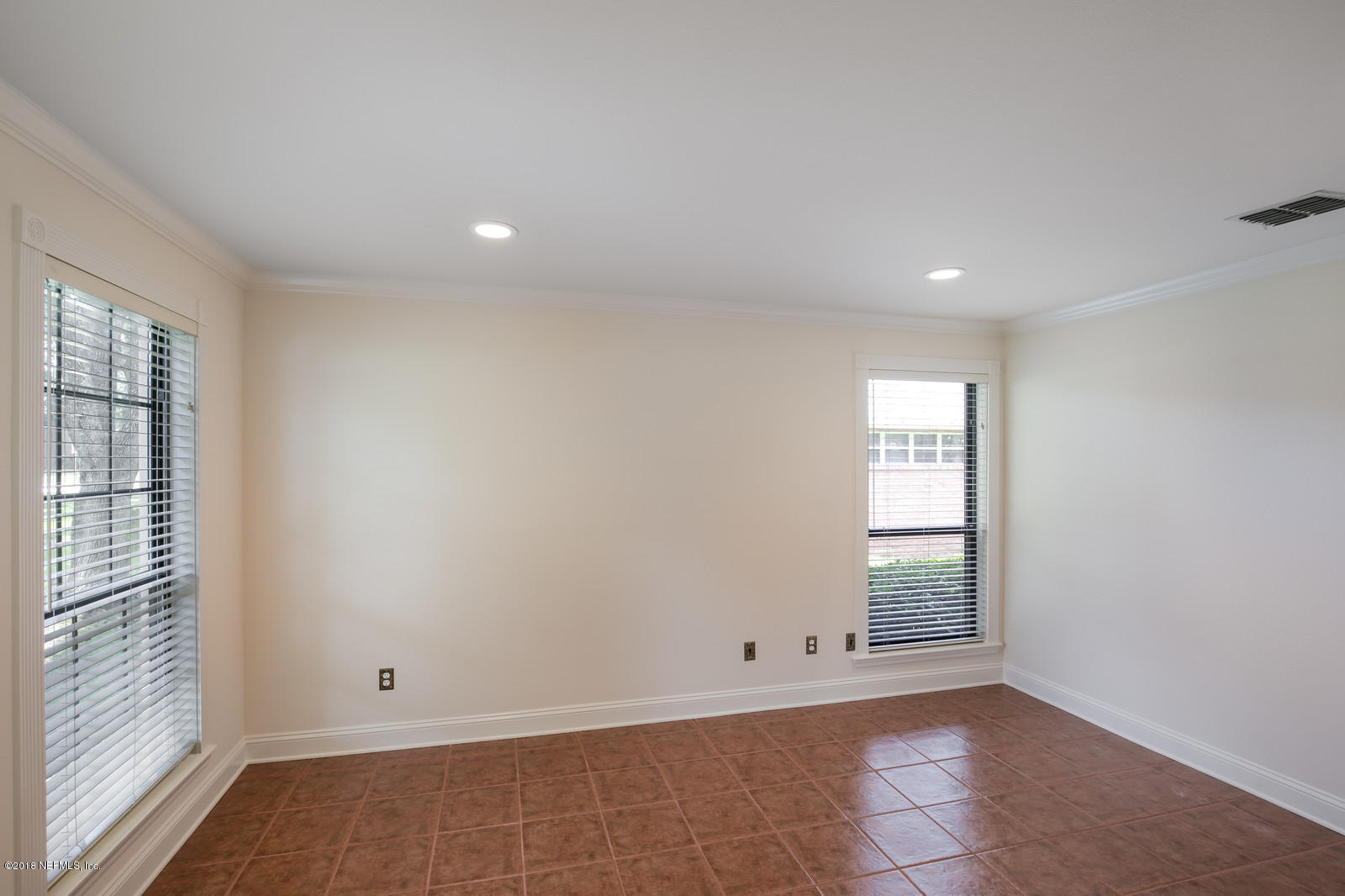 3130 Nautilus Road Middleburg, FL 32068 - Photo 5 of 67 an empty room with windows