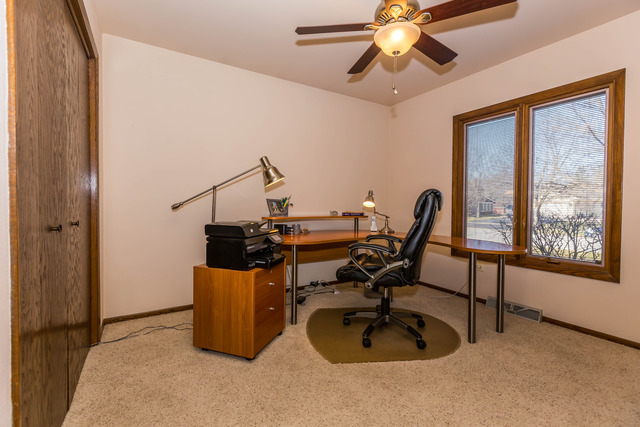 809 Overlook Drive Frankfort, IL 60423 - Photo 15 of 24 a view of a workspace with furniture and a window