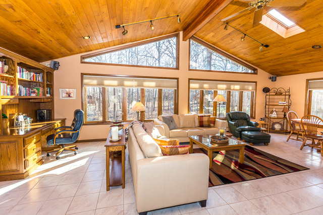 809 Overlook Drive Frankfort, IL 60423 - Photo 6 of 24 a living room with lots of furniture and a large window