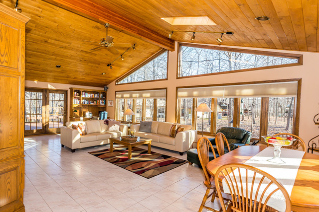 809 Overlook Drive Frankfort, IL 60423 - Photo 7 of 24 a living room with furniture a couch and large windows