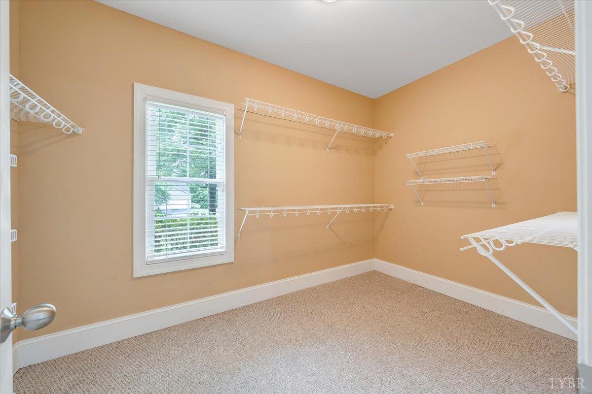 1250 Our Cove Road Huddleston, VA 24104 - Photo 26 of 70 an empty room with a window