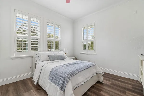 a view of a swimming pool with sitting area