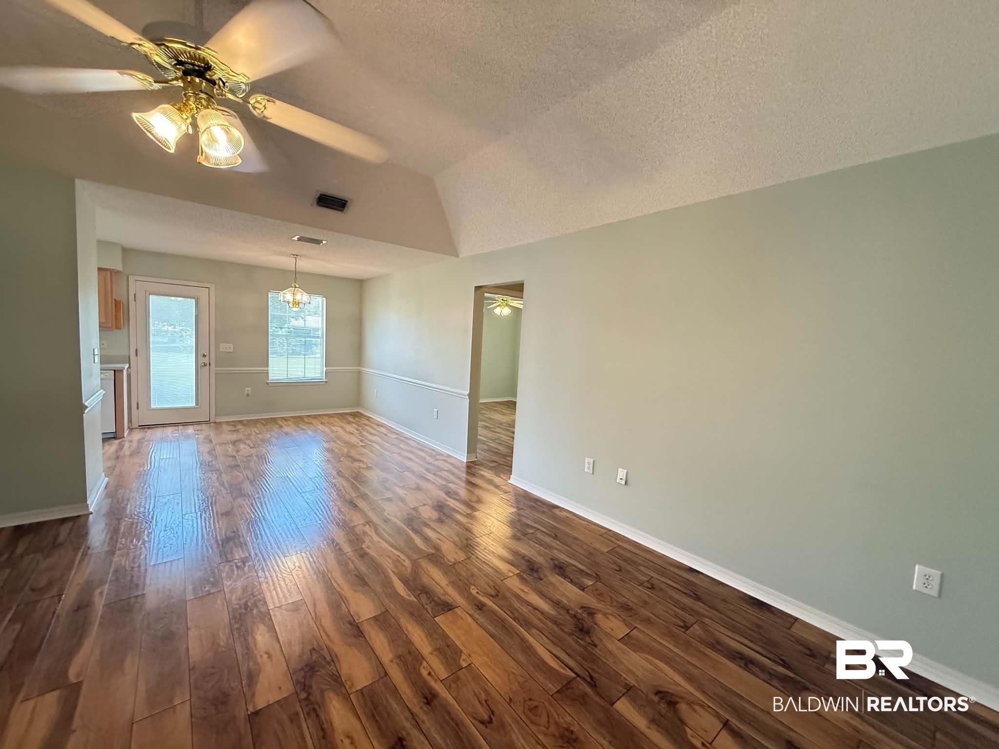 123 Pennbrooke Loop Foley, AL 36535 - Photo 14 of 49 Vaulted ceiling featuring a ceiling fan with integrated lighting