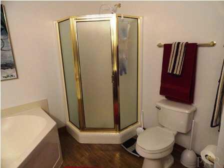 1950 Smyers Road Cantonment, FL 32533 - Photo 19 of 25 a bathroom with a toilet and a shower