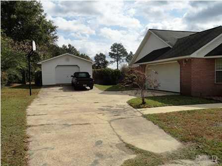 1950 Smyers Road Cantonment, FL 32533 - Photo 3 of 25 a view of a house with a yard