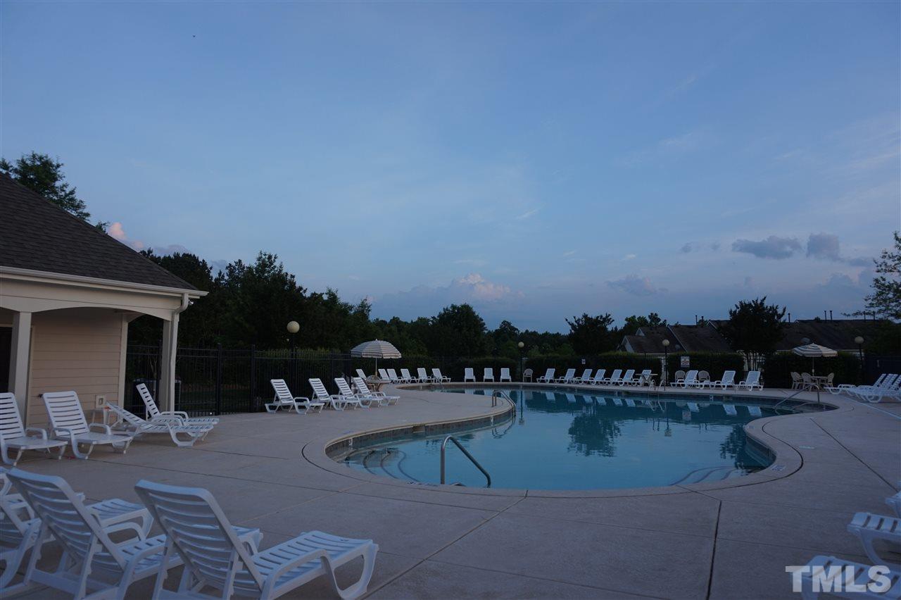 7815 Spungold Street Raleigh, NC 27617 - Photo 25 of 25 a view of a swimming pool with a patio