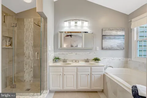 a bedroom with a bed and a table