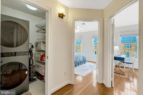 a bathroom with a sink a toilet and shower curtain
