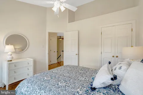 a bathroom with a toilet a sink and a mirror