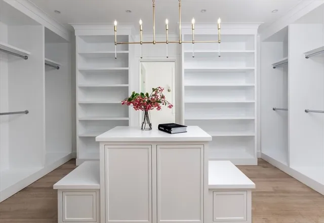 a view of a hallway with washer and dryer