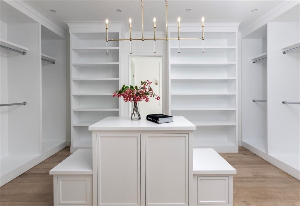 222 Warren Street Brookline, MA 02445 - Photo 19 of 33 a view of a hallway with washer and dryer