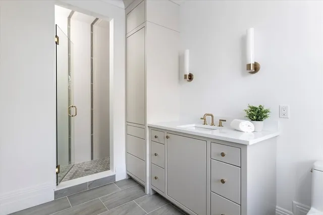 a view of cabinets and wooden floor