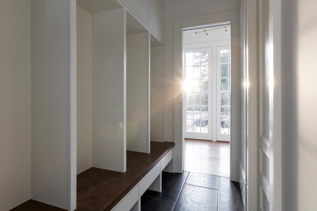 222 Warren Street Brookline, MA 02445 - Photo 29 of 33 a view of a hallway with windows