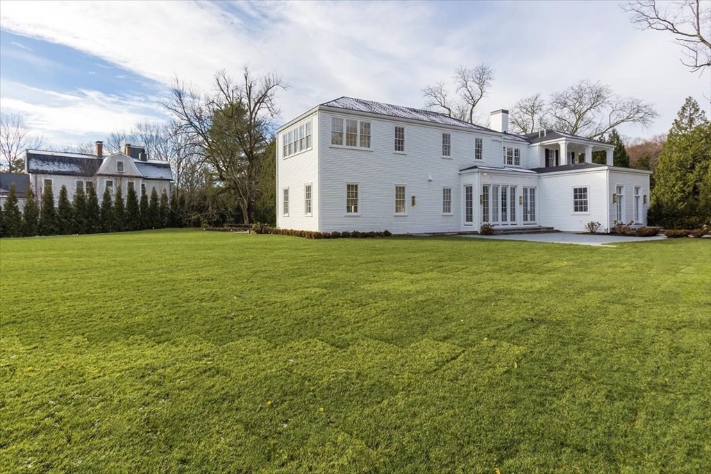 222 Warren Street Brookline, MA 02445 - Photo 32 of 33 a view of a house with backyard and garden