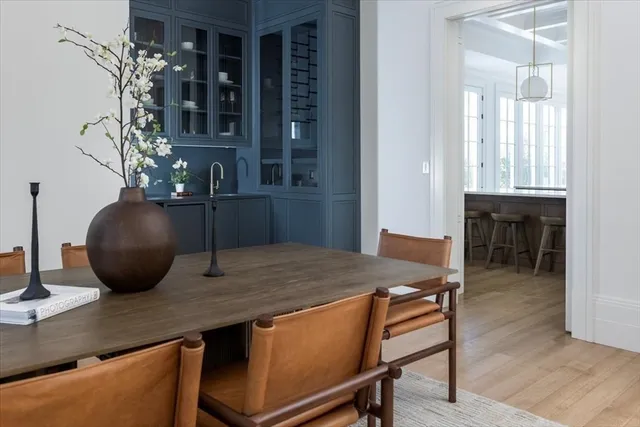 a view of a dining room with furniture and window