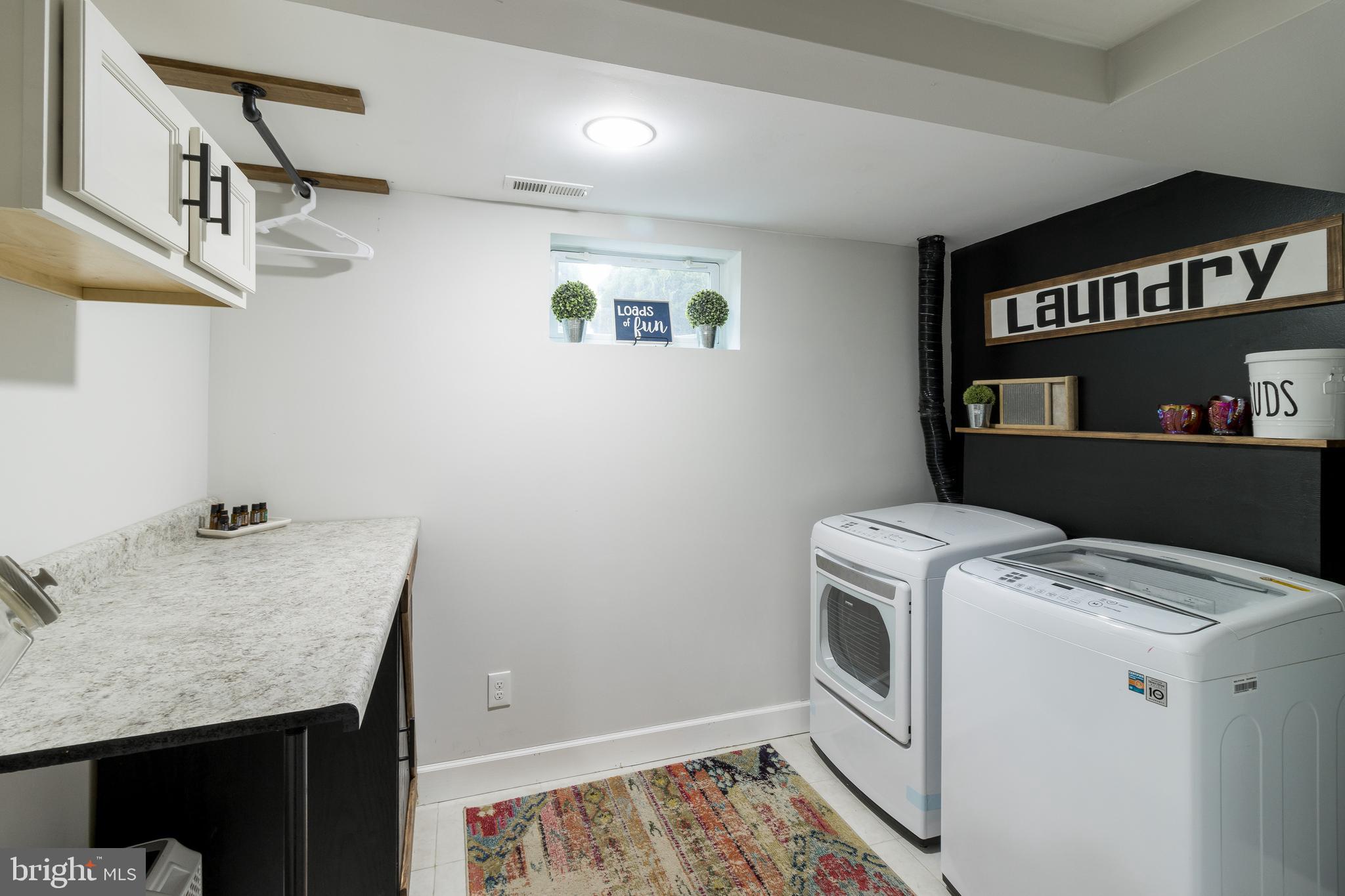 1668 St Margarets Road Annapolis, MD 21409 - Photo 31 of 59 Laundry with added storage and counter space