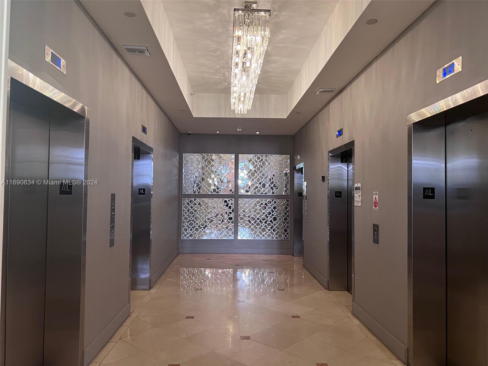 100 Lincoln Road, Unit 1016 Miami Beach, FL 33139 - Photo 23 of 25 a view of entryway with a floor to ceiling window and an entryway