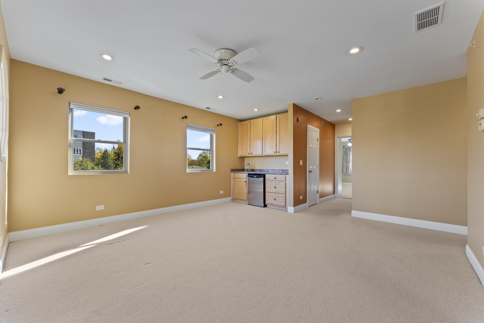 5533 Lincoln Avenue Morton Grove, IL 60053 - Photo 19 of 40 a view of an empty room with a window