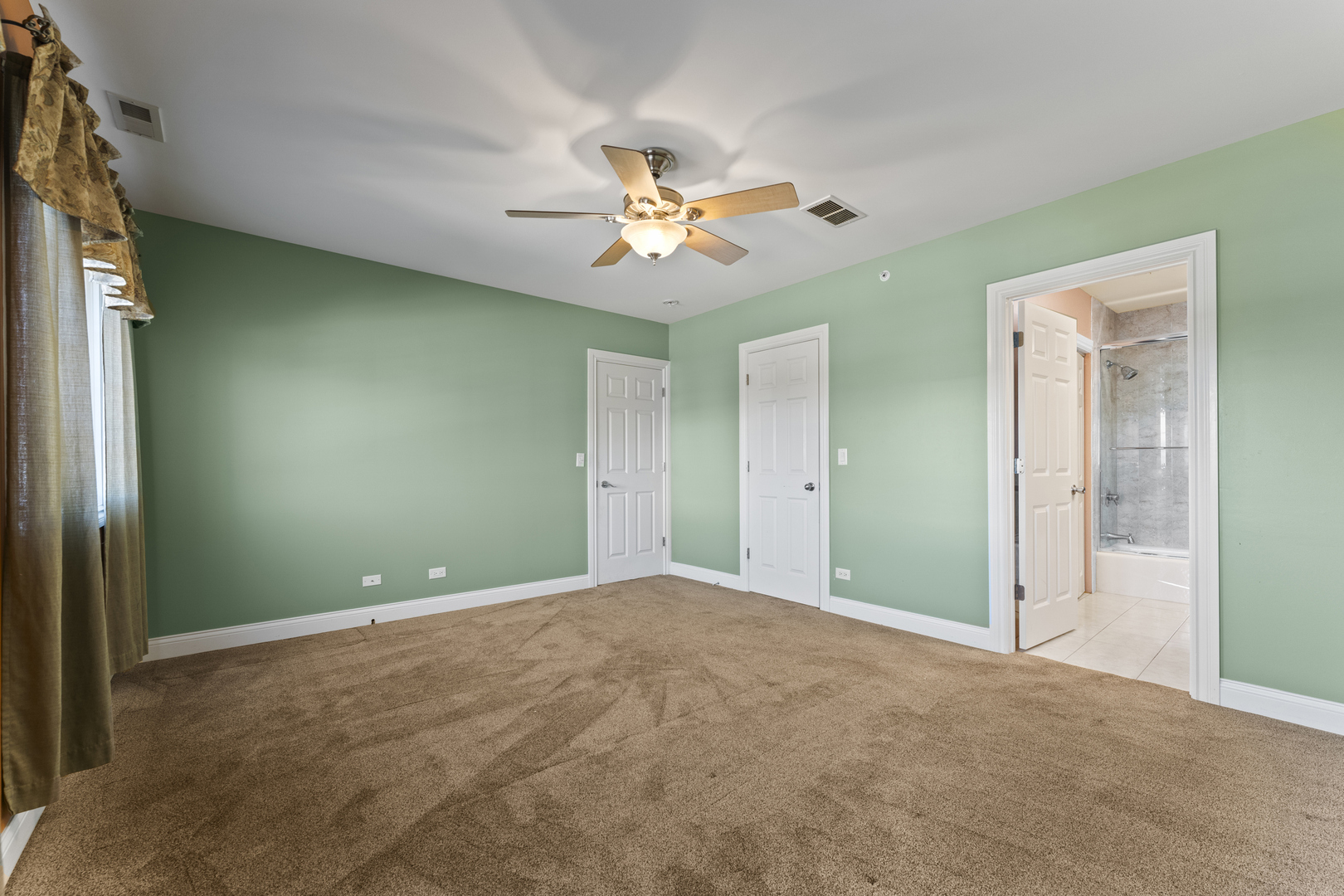 5533 Lincoln Avenue Morton Grove, IL 60053 - Photo 22 of 40 a view of an empty room with a window
