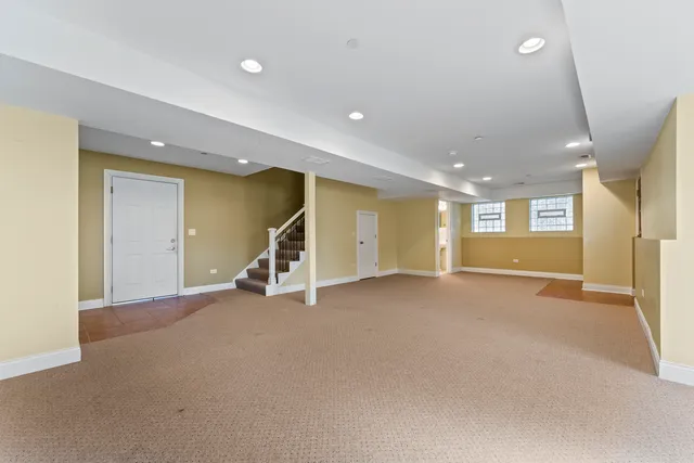 a view of a livingroom with a staircase