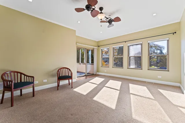 a view of a porch with furniture and a window