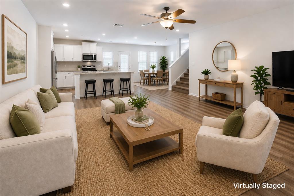 6317 Elephant Butte Drive Waco, TX 76708 - Photo 16 of 40 Open-concept living area featuring wood-finish flooring, recessed lighting, and a ceiling fan