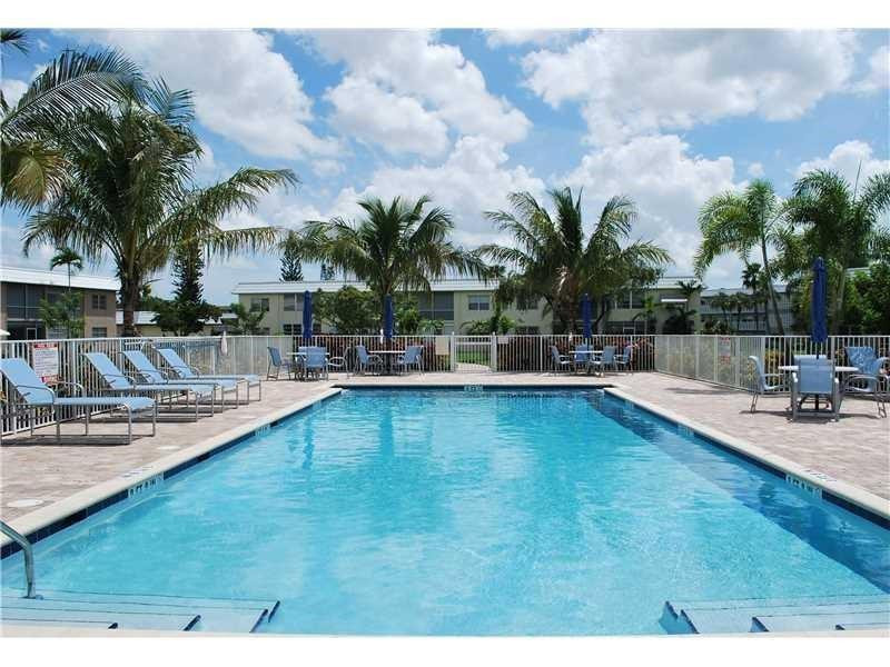 9788 Marina Boulevard, Unit 313 Boca Raton, FL 33428 - Photo 1 of 65 BIG POOL BEHIND CLUBHOUSE