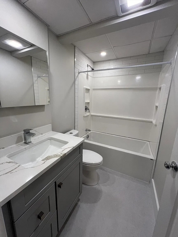 17 Carson Street, Unit 6C Boston, MA 02125 - Photo 9 of 11 a bathroom with a granite countertop sink toilet and shower