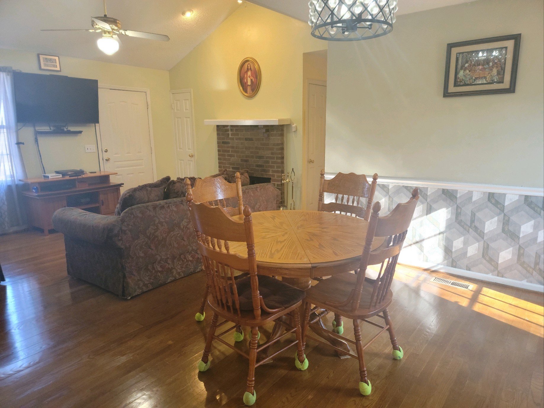 1108 Rural Hill Road Antioch, TN 37013 - Photo 2 of 4 a living room with furniture a flat screen tv and a table