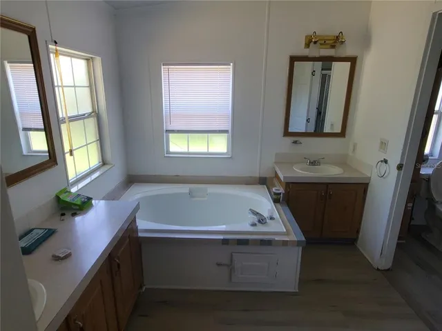 a room with table and mirror