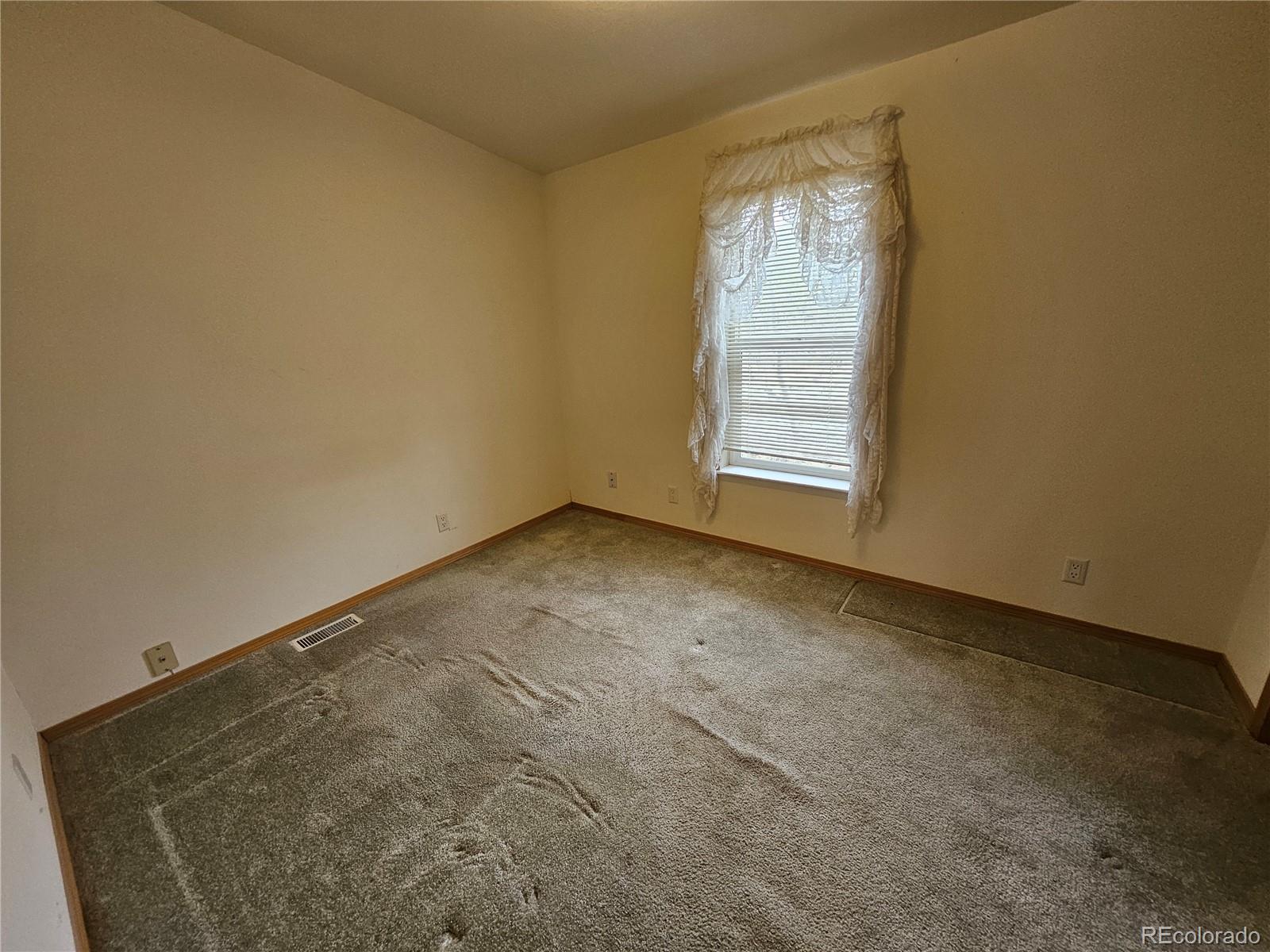 631 Arrowhead Drive Como, CO 80432 - Photo 21 of 45 a view of an empty room with a window