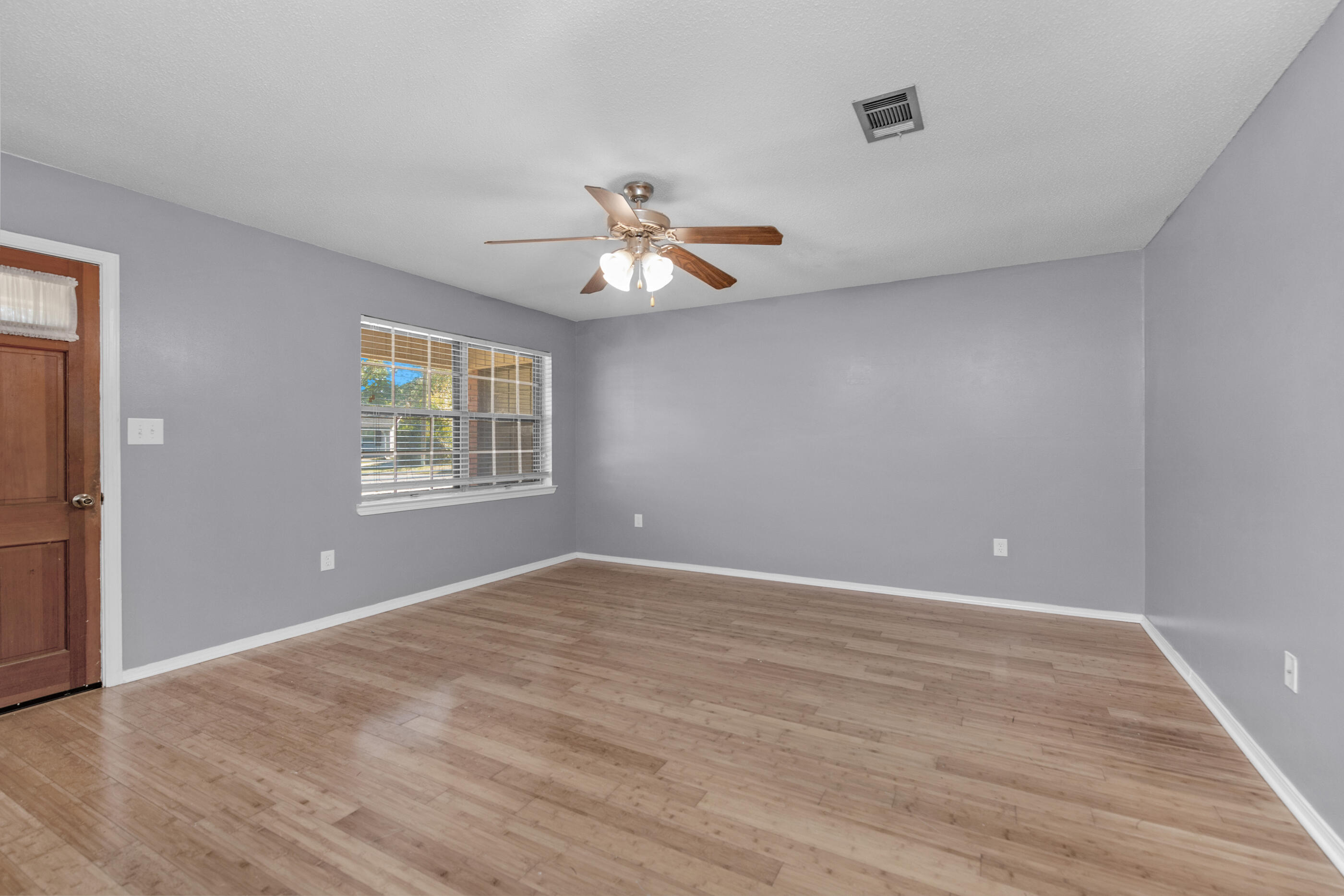 235 Deluna Road Southwest Fort Walton Beach, FL 32548 - Photo 14 of 29 a view of an empty room with a window