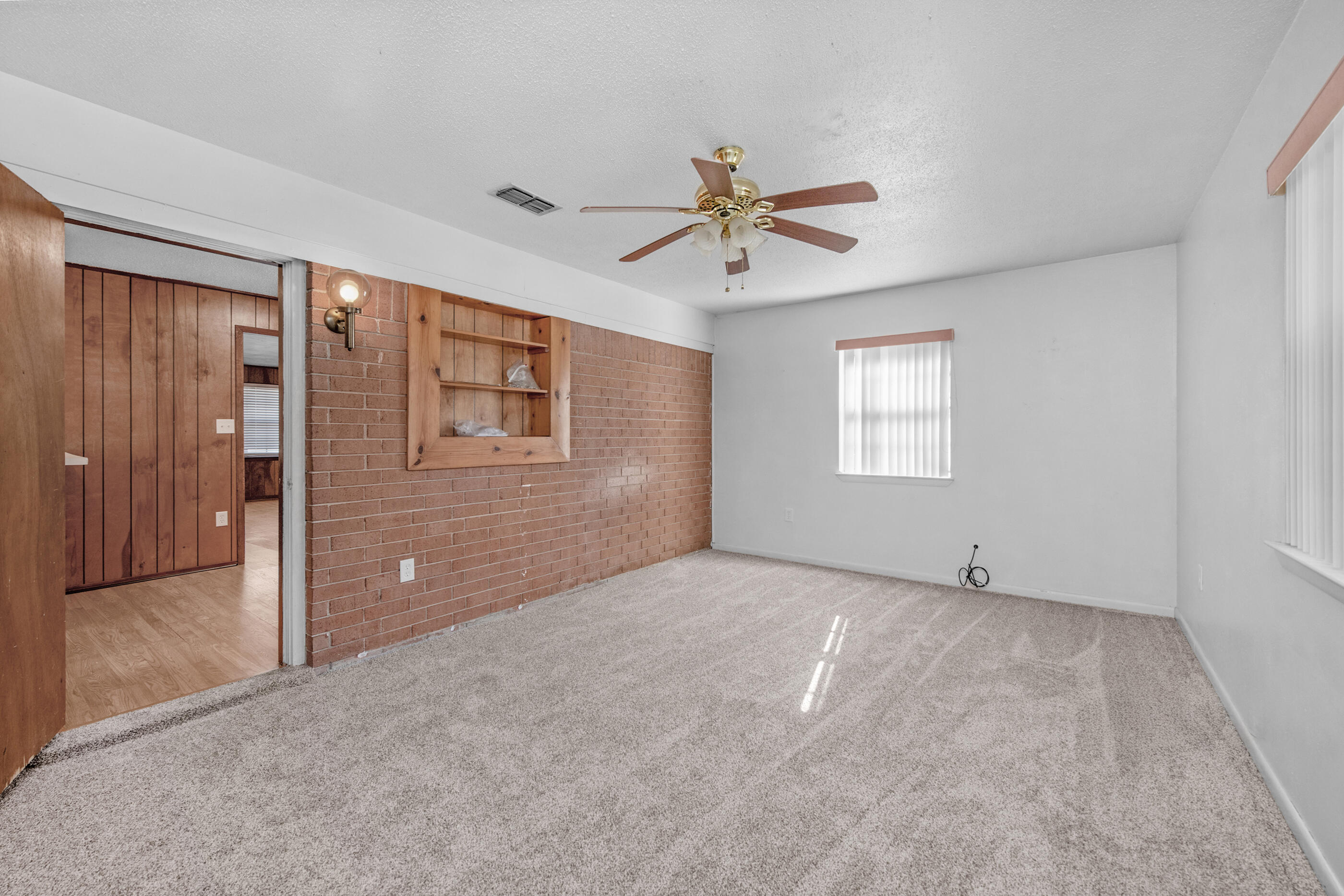 235 Deluna Road Southwest Fort Walton Beach, FL 32548 - Photo 7 of 29 a view of an empty room with a window
