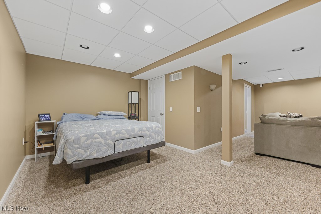 3982 Baird Road Stow, OH 44224 - Photo 33 of 50 Recreation room with carpet floors, recessed lighting, and a drop ceiling