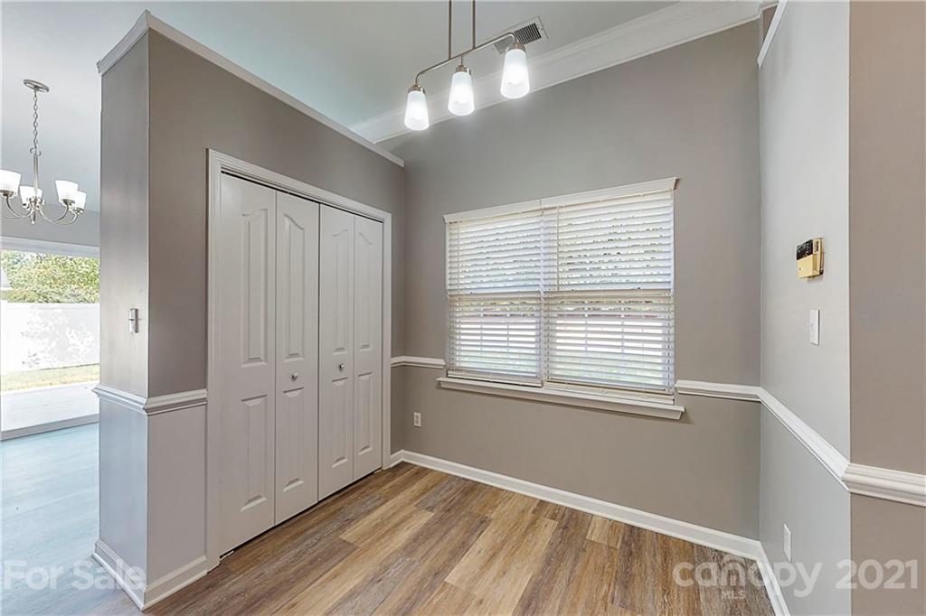 15387 Leslie Brooke Road Huntersville, NC 28078 - Photo 12 of 37 a view of an empty room with a window