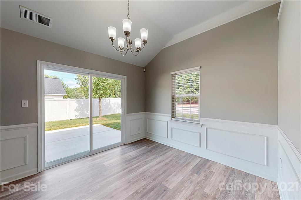 15387 Leslie Brooke Road Huntersville, NC 28078 - Photo 13 of 37 a view of an empty room with a window