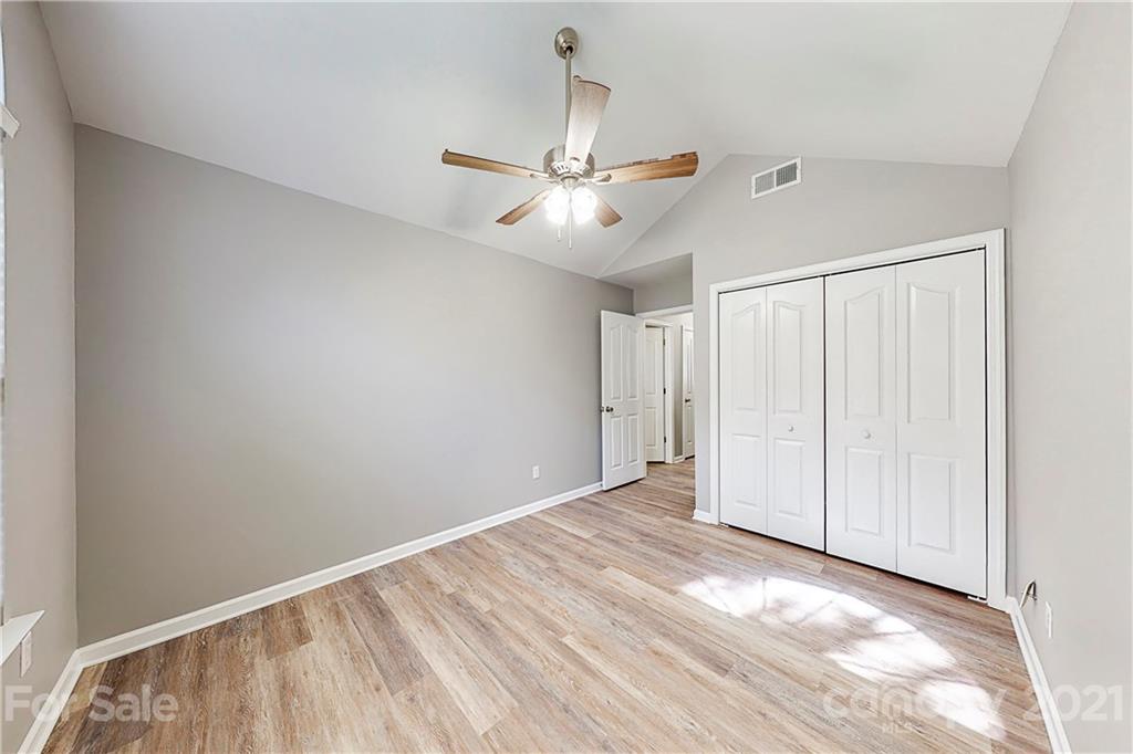 15387 Leslie Brooke Road Huntersville, NC 28078 - Photo 23 of 37 a view of an empty room with a window