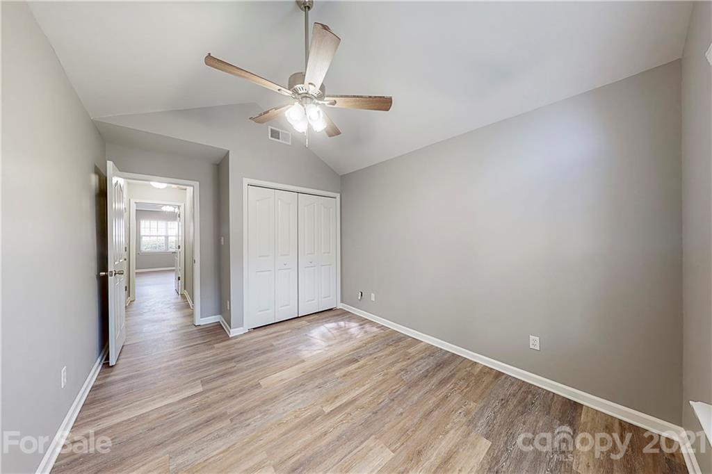 15387 Leslie Brooke Road Huntersville, NC 28078 - Photo 24 of 37 wooden floor in an empty room with a window