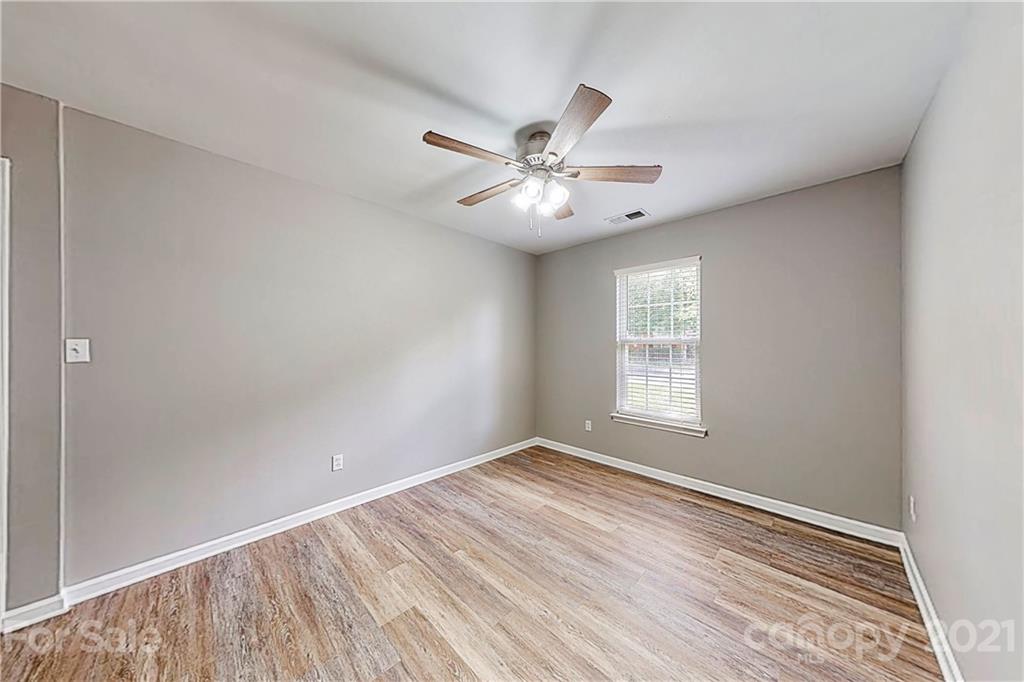 15387 Leslie Brooke Road Huntersville, NC 28078 - Photo 26 of 37 a view of an empty room with a window