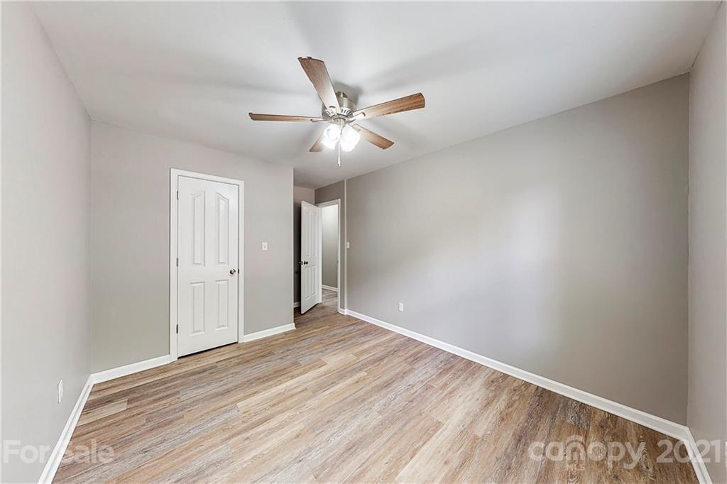 15387 Leslie Brooke Road Huntersville, NC 28078 - Photo 27 of 37 a view of an empty room with a window