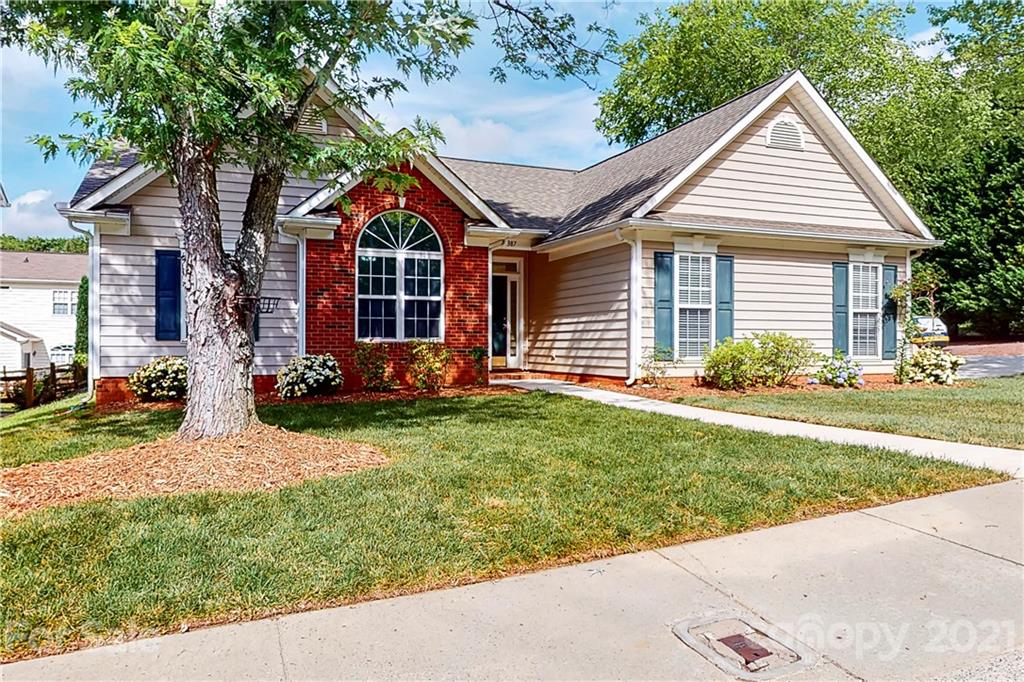 15387 Leslie Brooke Road Huntersville, NC 28078 - Photo 30 of 37 a front view of a house with a yard