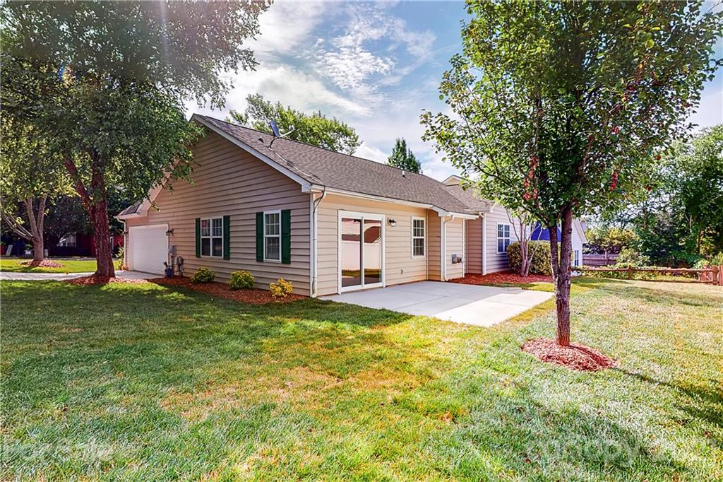 15387 Leslie Brooke Road Huntersville, NC 28078 - Photo 31 of 37 a view of a house with backyard and tree s