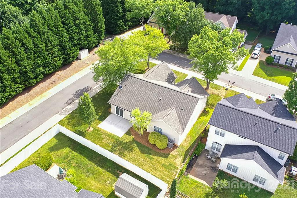 15387 Leslie Brooke Road Huntersville, NC 28078 - Photo 34 of 37 an aerial view of a house with a garden and swimming pool