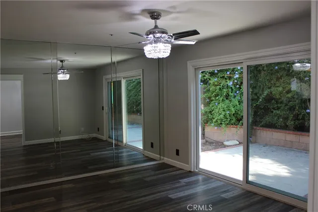 a view of an entryway with a chandelier