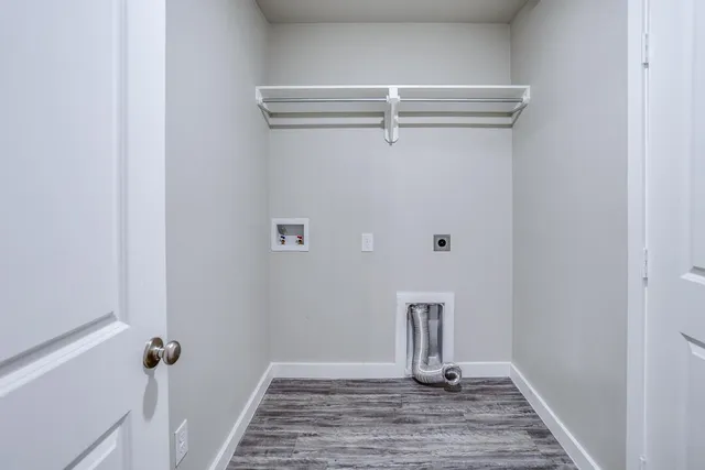 a view of a livingroom with wooden floor