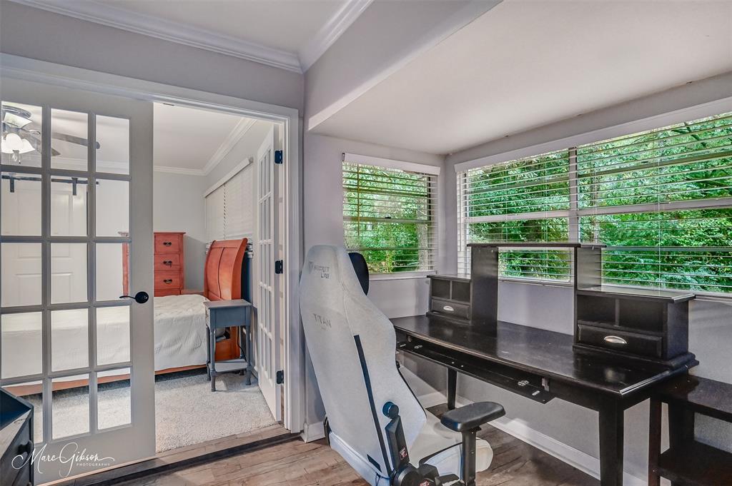 2912 Brookline Drive Shreveport, LA 71119 - Photo 13 of 27 a view of a workspace with furniture and a window