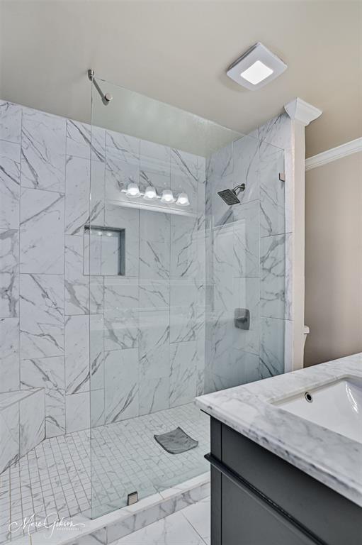 2912 Brookline Drive Shreveport, LA 71119 - Photo 16 of 27 a bathroom with a sink a shower and a mirror