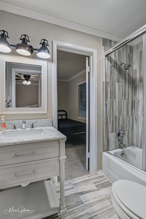 2912 Brookline Drive Shreveport, LA 71119 - Photo 18 of 27 a en suite bathroom with a granite countertop sink and a mirror